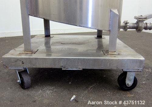 Used Water Cooling Corporation Tank, 100 Gallons, 304 Stainless Steel, Vertical. Approximately 31" diameter x 34" straight side.  Flat top with a bolt-on hinged cover, 6" sloped bottom.  2" Tri-clamp...