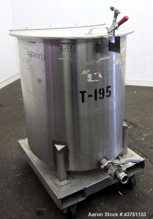 Used Water Cooling Corporation Tank, 100 Gallons, 304 Stainless Steel, Vertical. Approximately 31" diameter x 34" straight side.  Flat top with a bolt-on hinged cover, 6" sloped bottom.  2" Tri-clamp...