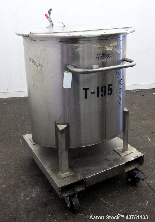 Used Water Cooling Corporation Tank, 100 Gallons, 304 Stainless Steel, Vertical. Approximately 31" diameter x 34" straight side.  Flat top with a bolt-on hinged cover, 6" sloped bottom.  2" Tri-clamp...