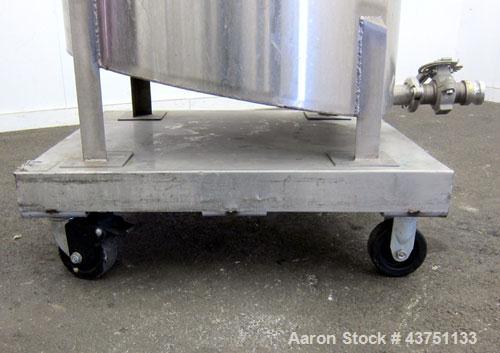 Used Water Cooling Corporation Tank, 100 Gallons, 304 Stainless Steel, Vertical. Approximately 31" diameter x 34" straight side.  Flat top with a bolt-on hinged cover, 6" sloped bottom.  2" Tri-clamp...