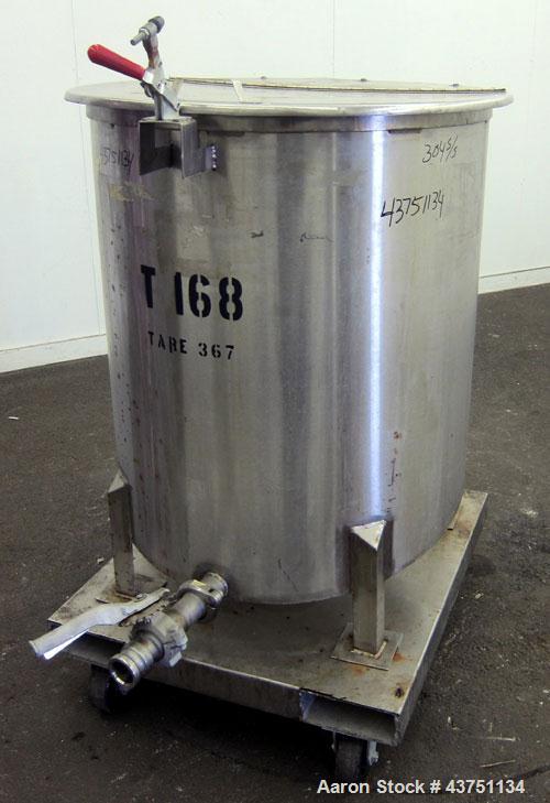 Used Water Cooling Corporation Tank, 100 Gallons, 304 Stainless Steel, Vertical. Approximately 31" diameter x 34" straight side.  Flat top with a bolt-on hinged cover, 6" sloped bottom.  2" Tri-clamp...