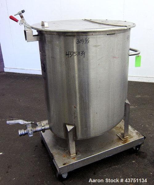 Used Water Cooling Corporation Tank, 100 Gallons, 304 Stainless Steel, Vertical. Approximately 31" diameter x 34" straight side.  Flat top with a bolt-on hinged cover, 6" sloped bottom.  2" Tri-clamp...