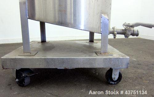 Used Water Cooling Corporation Tank, 100 Gallons, 304 Stainless Steel, Vertical. Approximately 31" diameter x 34" straight side.  Flat top with a bolt-on hinged cover, 6" sloped bottom.  2" Tri-clamp...