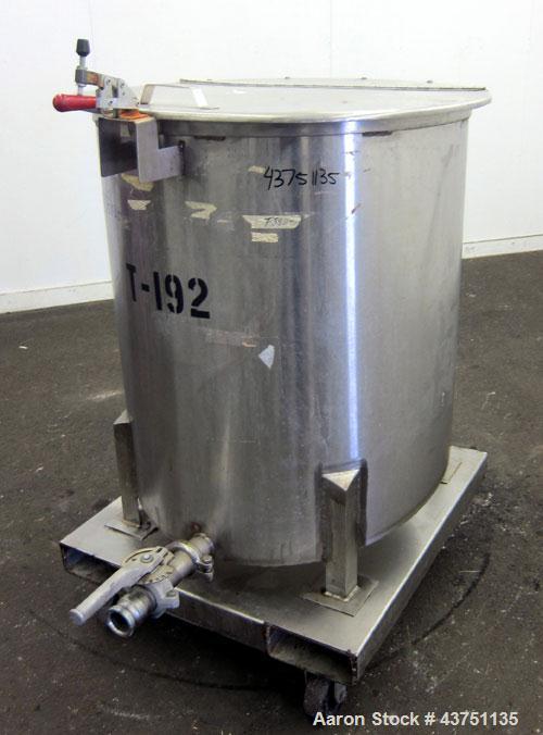Used Water Cooling Corporation Tank, 100 Gallons, 304 Stainless Steel, Vertical. Approximately 31" diameter x 34" straight side.  Flat top with a bolt-on hinged cover, 6" sloped bottom.  2" Tri-clamp...