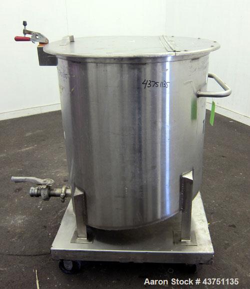 Used Water Cooling Corporation Tank, 100 Gallons, 304 Stainless Steel, Vertical. Approximately 31" diameter x 34" straight side.  Flat top with a bolt-on hinged cover, 6" sloped bottom.  2" Tri-clamp...