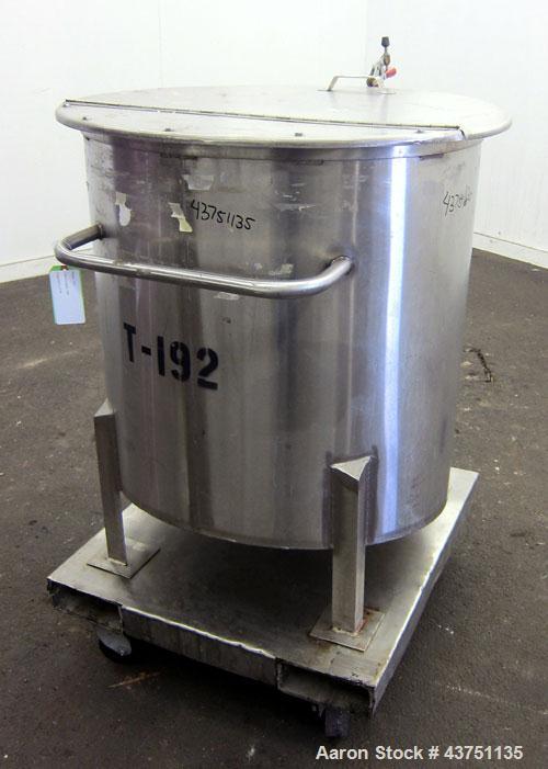Used Water Cooling Corporation Tank, 100 Gallons, 304 Stainless Steel, Vertical. Approximately 31" diameter x 34" straight side.  Flat top with a bolt-on hinged cover, 6" sloped bottom.  2" Tri-clamp...
