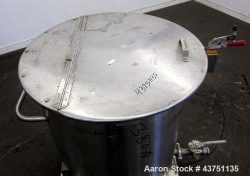 Used Water Cooling Corporation Tank, 100 Gallons, 304 Stainless Steel, Vertical. Approximately 31" diameter x 34" straight side.  Flat top with a bolt-on hinged cover, 6" sloped bottom.  2" Tri-clamp...