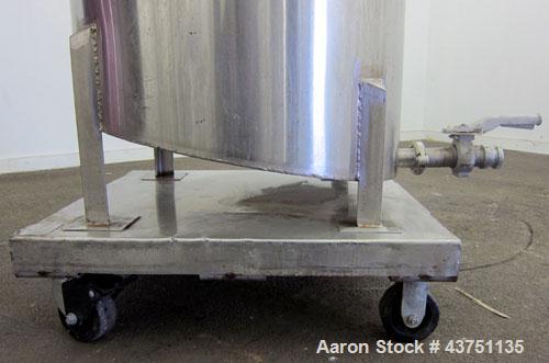 Used Water Cooling Corporation Tank, 100 Gallons, 304 Stainless Steel, Vertical. Approximately 31" diameter x 34" straight side.  Flat top with a bolt-on hinged cover, 6" sloped bottom.  2" Tri-clamp...