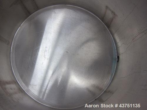 Used Water Cooling Corporation Tank, 100 Gallons, 304 Stainless Steel, Vertical. Approximately 31" diameter x 34" straight side.  Flat top with a bolt-on hinged cover, 6" sloped bottom.  2" Tri-clamp...