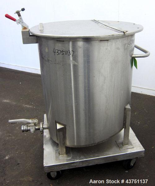 Used Water Cooling Corporation Tank, 100 Gallons, 304 Stainless Steel, Vertical. Approximately 31" diameter x 34" straight side.  Flat top with a bolt-on hinged cover, 6" sloped bottom.  2" Tri-clamp...