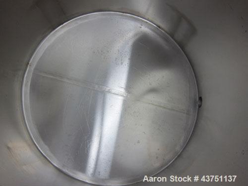 Used Water Cooling Corporation Tank, 100 Gallons, 304 Stainless Steel, Vertical. Approximately 31" diameter x 34" straight side.  Flat top with a bolt-on hinged cover, 6" sloped bottom.  2" Tri-clamp...