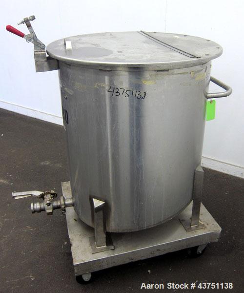 Used Water Cooling Corporation Tank, 100 Gallons, 304 Stainless Steel, Vertical. Approximately 31" diameter x 34" straight side.  Flat top with a bolt-on hinged cover, 6" sloped bottom.  2" Tri-clamp...