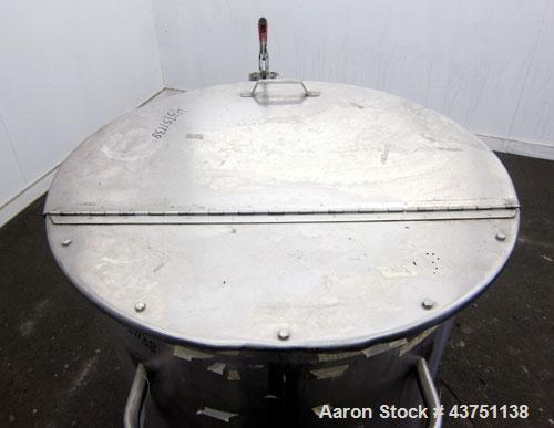 Used Water Cooling Corporation Tank, 100 Gallons, 304 Stainless Steel, Vertical. Approximately 31" diameter x 34" straight side.  Flat top with a bolt-on hinged cover, 6" sloped bottom.  2" Tri-clamp...