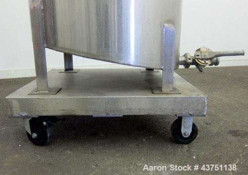 Used Water Cooling Corporation Tank, 100 Gallons, 304 Stainless Steel, Vertical. Approximately 31" diameter x 34" straight side.  Flat top with a bolt-on hinged cover, 6" sloped bottom.  2" Tri-clamp...