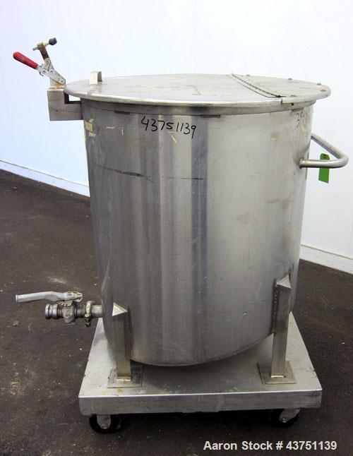 Used Water Cooling Corporation Tank, 100 Gallons, 304 Stainless Steel, Vertical. Approximately 31" diameter x 34" straight side.  Flat top with a bolt-on hinged cover, 6" sloped bottom.  2" Tri-clamp...