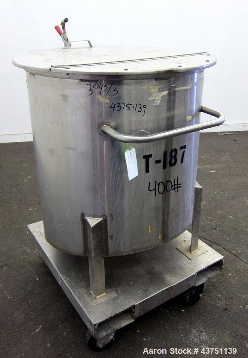 Used Water Cooling Corporation Tank, 100 Gallons, 304 Stainless Steel, Vertical. Approximately 31" diameter x 34" straight side.  Flat top with a bolt-on hinged cover, 6" sloped bottom.  2" Tri-clamp...