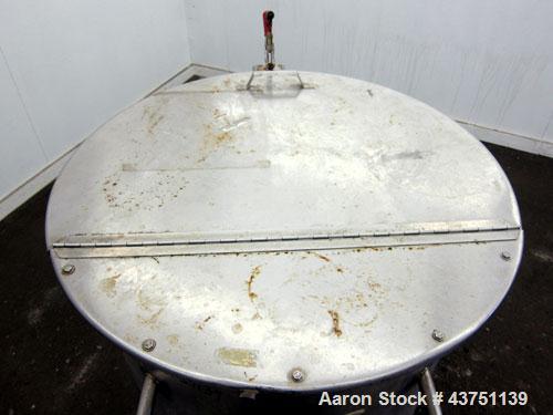 Used Water Cooling Corporation Tank, 100 Gallons, 304 Stainless Steel, Vertical. Approximately 31" diameter x 34" straight side.  Flat top with a bolt-on hinged cover, 6" sloped bottom.  2" Tri-clamp...