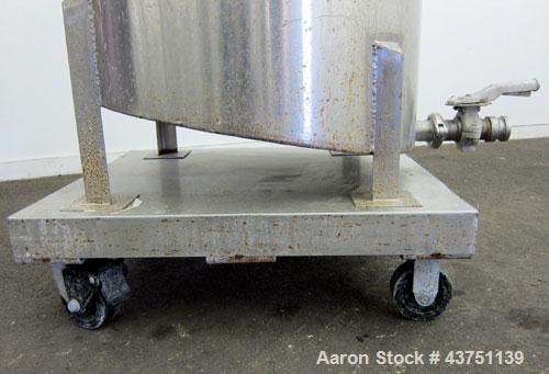 Used Water Cooling Corporation Tank, 100 Gallons, 304 Stainless Steel, Vertical. Approximately 31" diameter x 34" straight side.  Flat top with a bolt-on hinged cover, 6" sloped bottom.  2" Tri-clamp...