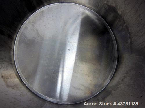 Used Water Cooling Corporation Tank, 100 Gallons, 304 Stainless Steel, Vertical. Approximately 31" diameter x 34" straight side.  Flat top with a bolt-on hinged cover, 6" sloped bottom.  2" Tri-clamp...