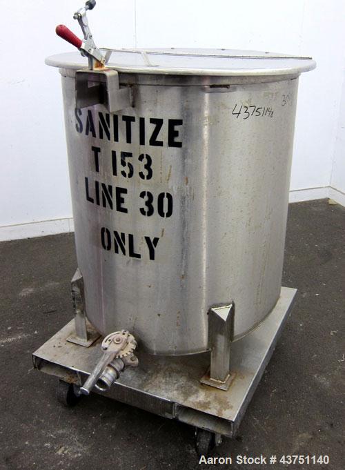 Used Water Cooling Corporation Tank, 100 Gallons, 304 Stainless Steel, Vertical. Approximately 31" diameter x 34" straight side.  Flat top with a bolt-on hinged cover, 6" sloped bottom.  2" Tri-clamp...