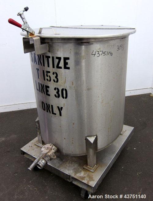 Used Water Cooling Corporation Tank, 100 Gallons, 304 Stainless Steel, Vertical. Approximately 31" diameter x 34" straight side.  Flat top with a bolt-on hinged cover, 6" sloped bottom.  2" Tri-clamp...