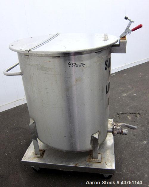 Used Water Cooling Corporation Tank, 100 Gallons, 304 Stainless Steel, Vertical. Approximately 31" diameter x 34" straight side.  Flat top with a bolt-on hinged cover, 6" sloped bottom.  2" Tri-clamp...
