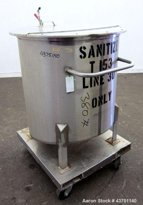 Used Water Cooling Corporation Tank, 100 Gallons, 304 Stainless Steel, Vertical. Approximately 31" diameter x 34" straight side.  Flat top with a bolt-on hinged cover, 6" sloped bottom.  2" Tri-clamp...