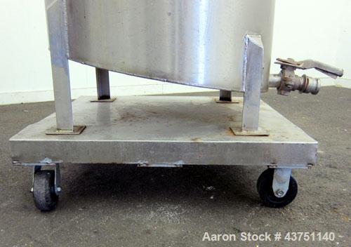 Used Water Cooling Corporation Tank, 100 Gallons, 304 Stainless Steel, Vertical. Approximately 31" diameter x 34" straight side.  Flat top with a bolt-on hinged cover, 6" sloped bottom.  2" Tri-clamp...