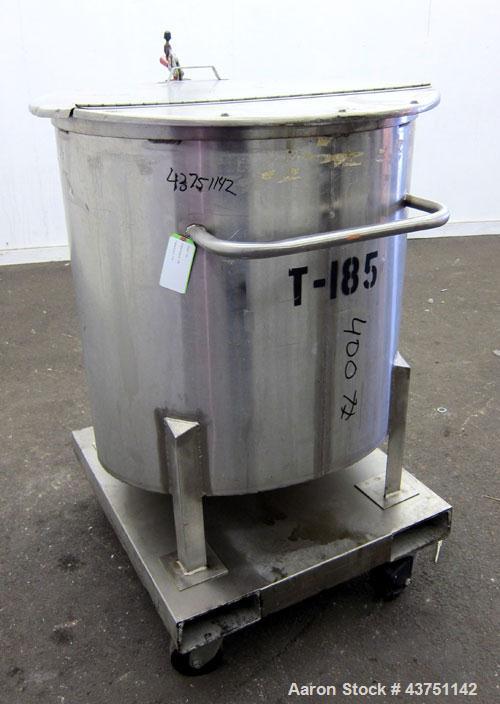 Used Water Cooling Corporation Tank, 100 Gallon, 304 Stainless Steel, Vertical. Approximately 31" diameter x 34" straight side.  Flat top with a bolt-on hinged cover, 6" sloped bottom.  2" Tri-clamp ...