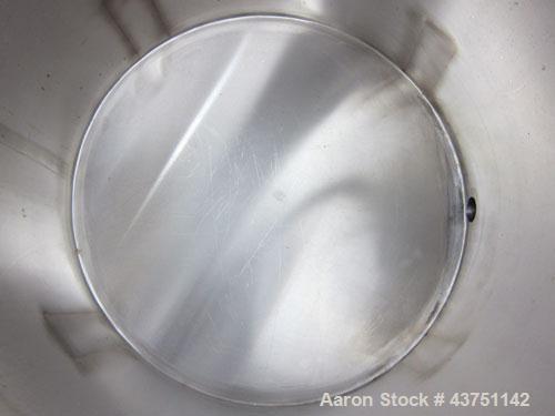Used Water Cooling Corporation Tank, 100 Gallon, 304 Stainless Steel, Vertical. Approximately 31" diameter x 34" straight side.  Flat top with a bolt-on hinged cover, 6" sloped bottom.  2" Tri-clamp ...
