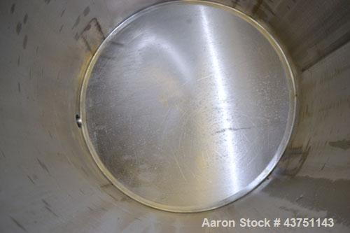 Used Water Cooling Corporation Tank, 100 Gallon, 304 Stainless Steel, Vertical. Approximately 31" diameter x 34" straight side.  Flat top with a bolt-on hinged cover, 6" sloped bottom.  2" Tri-clamp ...