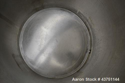 Used Water Cooling Corporation Tank, 100 Gallon, 304 Stainless Steel, Vertical. Approximately 31" diameter x 34" straight side.  Flat top with a bolt on hinged cover, 6" sloped bottom.  2" Tri-clamp ...