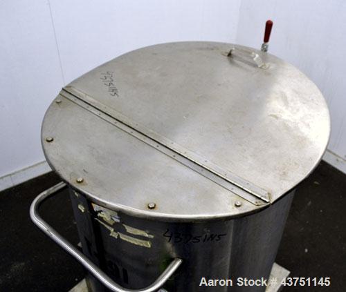 Used Water Cooling Corporation Tank, 100 Gallon, 304 Stainless Steel, Vertical. Approximately 31" diameter x 34" straight side.Flat top with a bolt-on hinged cover, 6" sloped bottom.2" Tri-clamp side...