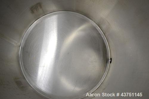 Used Water Cooling Corporation Tank, 100 Gallon, 304 Stainless Steel, Vertical. Approximately 31" diameter x 34" straight side.Flat top with a bolt-on hinged cover, 6" sloped bottom.2" Tri-clamp side...