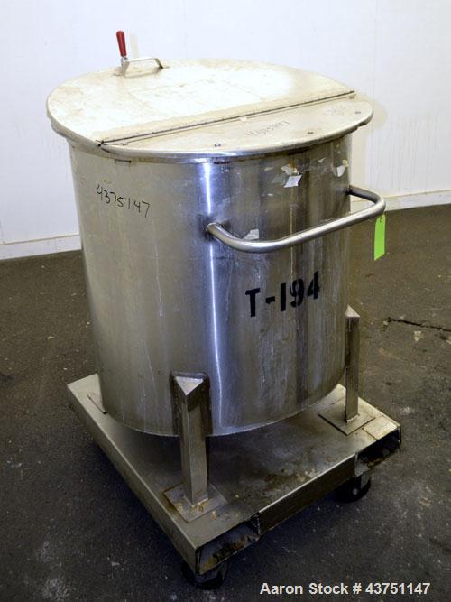 Used Water Cooling Corporation Tank, 100 Gallon, 304 Stainless Steel, Vertical. Approximately 31" diameter x 34" straight side.  Flat top with a bolt-on hinged cover, 6" sloped bottom.  2" Tri-clamp ...