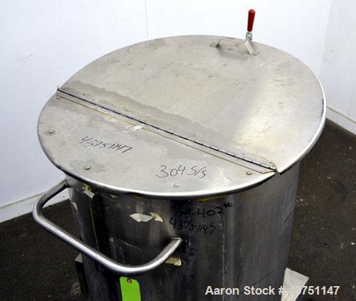 Used Water Cooling Corporation Tank, 100 Gallon, 304 Stainless Steel, Vertical. Approximately 31" diameter x 34" straight side.  Flat top with a bolt-on hinged cover, 6" sloped bottom.  2" Tri-clamp ...