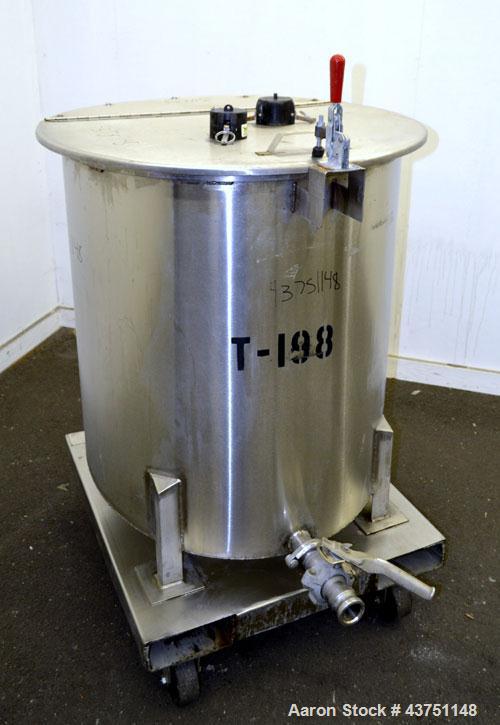 Used Water Cooling Corporation Tank, 100 Gallon, 304 Stainless Steel, Vertical. Approximately 31" diameter x 34" straight side.  Flat top with a bolt-on hinged cover, 6" sloped bottom.  2" Tri-clamp ...