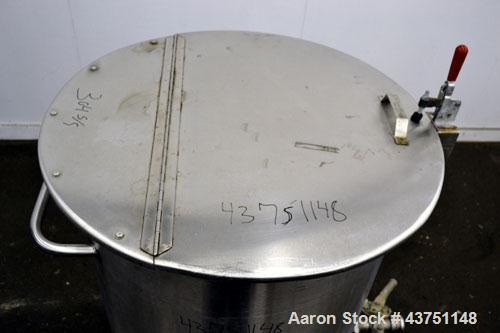 Used Water Cooling Corporation Tank, 100 Gallon, 304 Stainless Steel, Vertical. Approximately 31" diameter x 34" straight side.  Flat top with a bolt-on hinged cover, 6" sloped bottom.  2" Tri-clamp ...