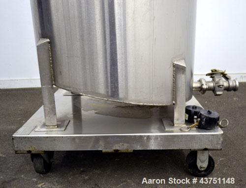 Used Water Cooling Corporation Tank, 100 Gallon, 304 Stainless Steel, Vertical. Approximately 31" diameter x 34" straight side.  Flat top with a bolt-on hinged cover, 6" sloped bottom.  2" Tri-clamp ...