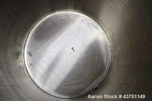 Used Water Cooling Corporation Tank, 100 Gallon, 304 Stainless Steel, Vertical. Approximately 31" diameter x 34" straight side.  Flat top with a bolt-on hinged cover, 6" sloped bottom.  2" Tri-clamp ...