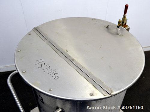 Used Water Cooling Corporation Tank, 100 Gallon, 304 Stainless Steel, Vertical. Approximately 31" diameter x 34" straight side.  Flat top with a bolt-on hinged cover, 6" sloped bottom.  2" Tri-clamp ...