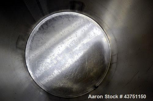 Used Water Cooling Corporation Tank, 100 Gallon, 304 Stainless Steel, Vertical. Approximately 31" diameter x 34" straight side.  Flat top with a bolt-on hinged cover, 6" sloped bottom.  2" Tri-clamp ...