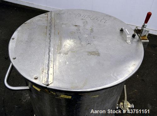 Used Water Cooling Corporation Tank, 100 Gallon, 304 Stainless Steel, Vertical. Approximately 31" diameter x 34" straight side.  Flat top with a bolt-on hinged cover, 6" sloped bottom.  2" Tri-clamp ...