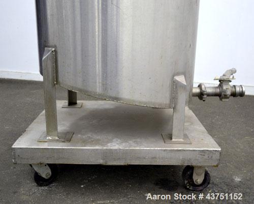 Used Water Cooling Corporation Tank, 100 Gallon, 304 Stainless Steel, Vertical. Approximately 31" diameter x 34" straight side.  Flat top with a bolt-on hinged cover, 6" sloped bottom.  2" Tri-clamp ...