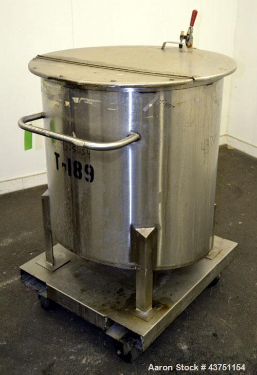Used Water Cooling Corporation Tank, 100 Gallon, 304 Stainless Steel, Vertical. Approximately 31" diameter x 34" straight side.  Flat top with a bolt-on hinged cover, 6" sloped bottom.  2" Tri-clamp ...