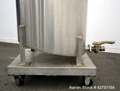 Used Water Cooling Corporation Tank, 100 Gallon, 304 Stainless Steel, Vertical. Approximately 31" diameter x 34" straight side.  Flat top with a bolt-on hinged cover, 6" sloped bottom.  2" Tri-clamp ...
