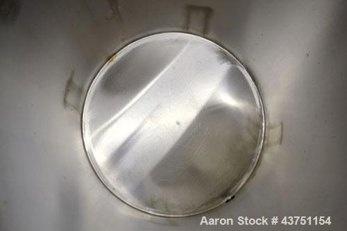 Used Water Cooling Corporation Tank, 100 Gallon, 304 Stainless Steel, Vertical. Approximately 31" diameter x 34" straight side.  Flat top with a bolt-on hinged cover, 6" sloped bottom.  2" Tri-clamp ...