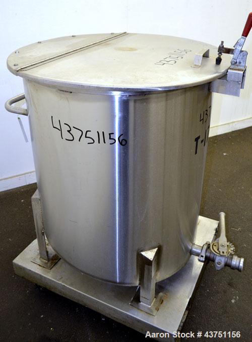 Used Water Cooling Corporation Tank, 100 Gallon, 304 Stainless Steel, Vertical. Approximately 31" diameter x 34" straight side.  Flat top with a bolt-on hinged cover, 6" sloped bottom.  2" Tri-clamp ...