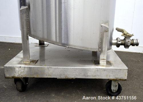 Used Water Cooling Corporation Tank, 100 Gallon, 304 Stainless Steel, Vertical. Approximately 31" diameter x 34" straight side.  Flat top with a bolt-on hinged cover, 6" sloped bottom.  2" Tri-clamp ...
