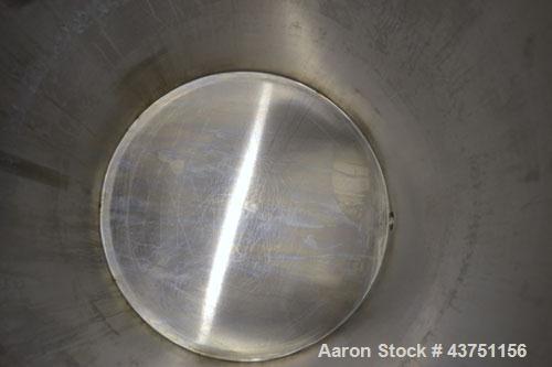 Used Water Cooling Corporation Tank, 100 Gallon, 304 Stainless Steel, Vertical. Approximately 31" diameter x 34" straight side.  Flat top with a bolt-on hinged cover, 6" sloped bottom.  2" Tri-clamp ...